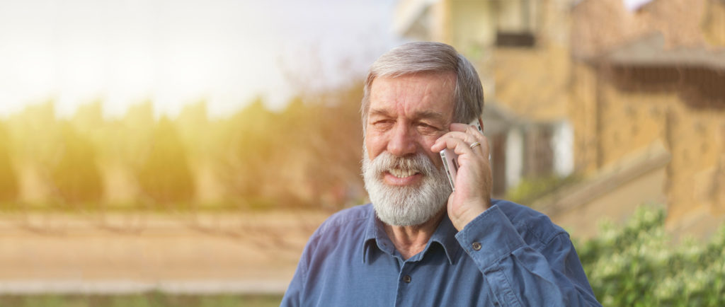 Older Man Talking on Cell Phone | Hearing Loss image