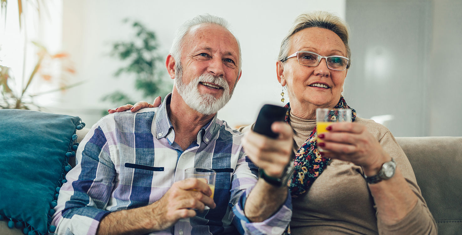 Older Couple Watching TV | Hearing Loss image