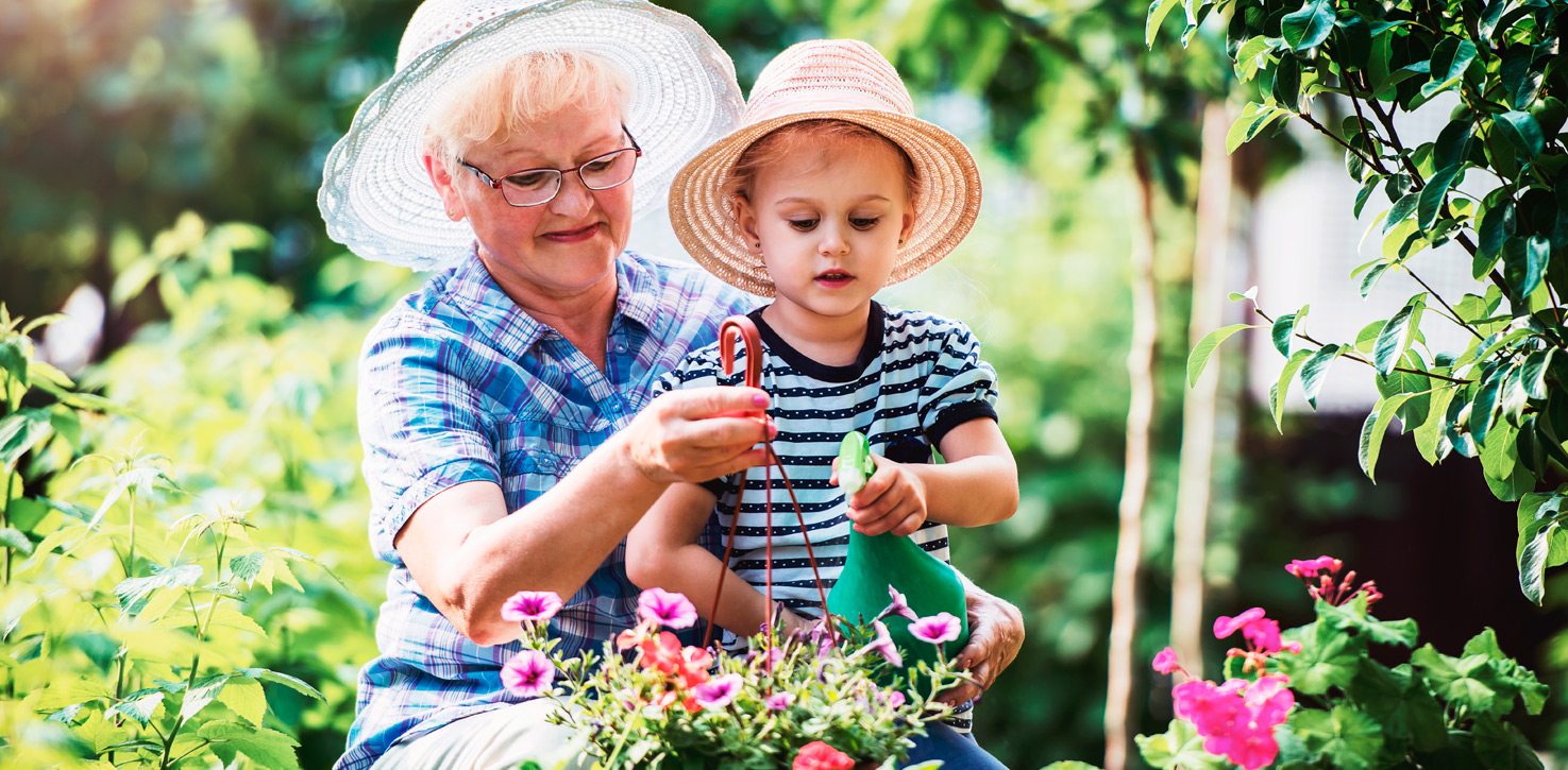 grandma and grandchild gardening image